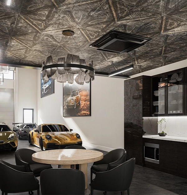 Luxury garage interior featuring sports cars and custom design by Clive Daniel