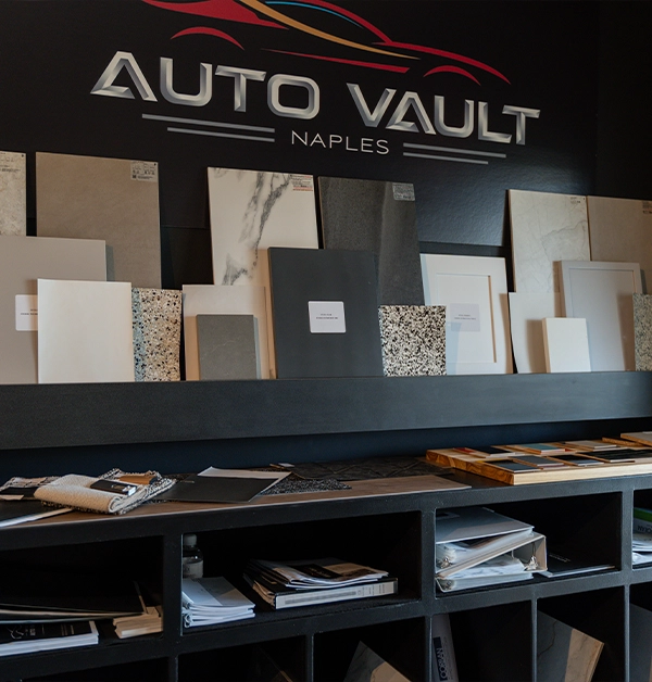 Design samples and finishes on display inside the Auto Vault Naples design studio