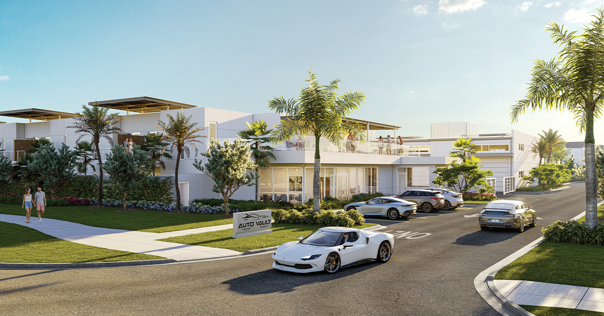 Exterior scene showing the entrance to a luxury auto vault campus with palm-lined streets, modern white buildings, and exotic cars arriving.