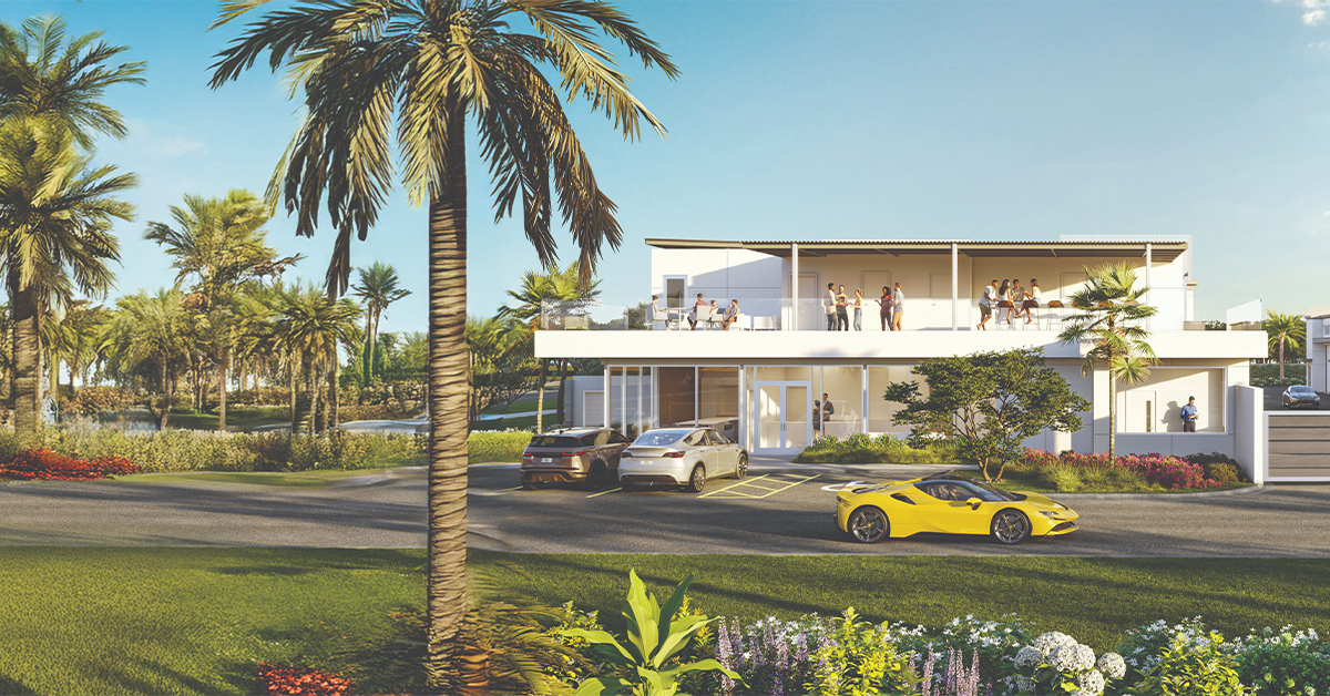 Front exterior of modern auto vault building with palm trees and luxury cars parked outside.
