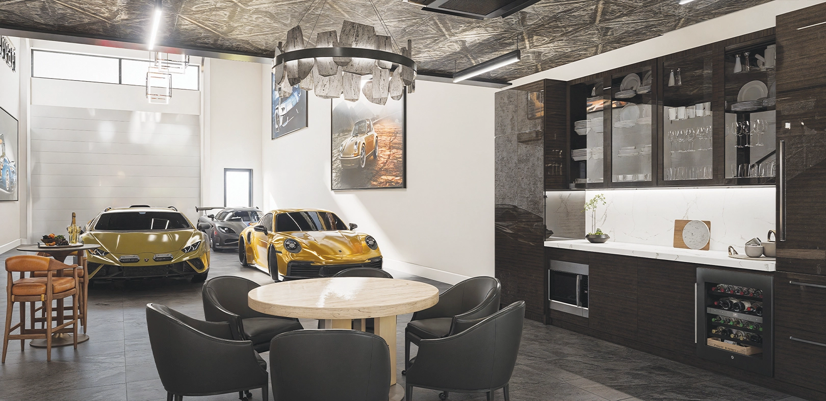 Luxury garage with sports cars parked beside a modern kitchen, cabinets, and round dining table
