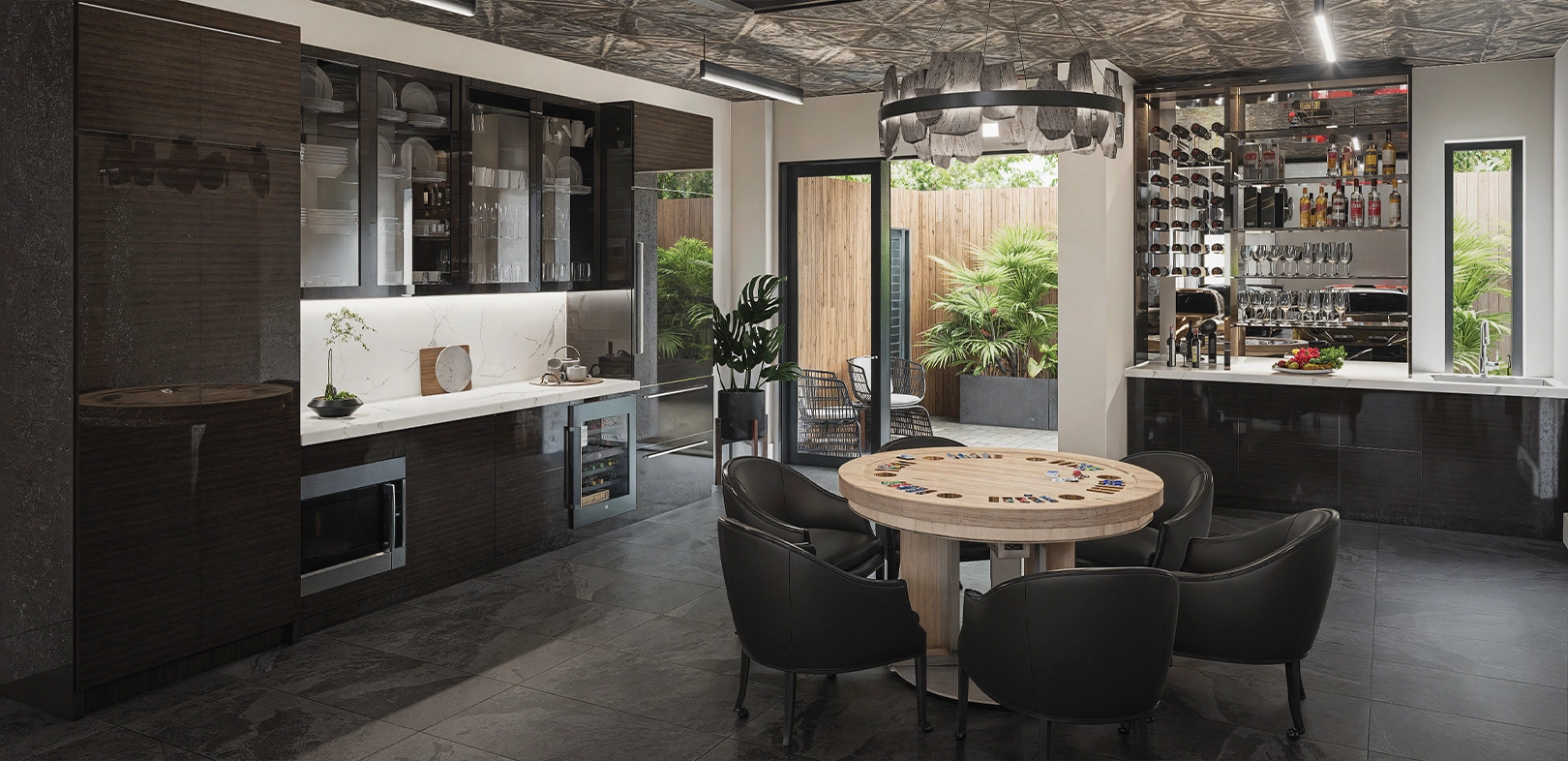 Garage lounge with bar, wine rack, round table seating, and sliding doors to a tropical patio
